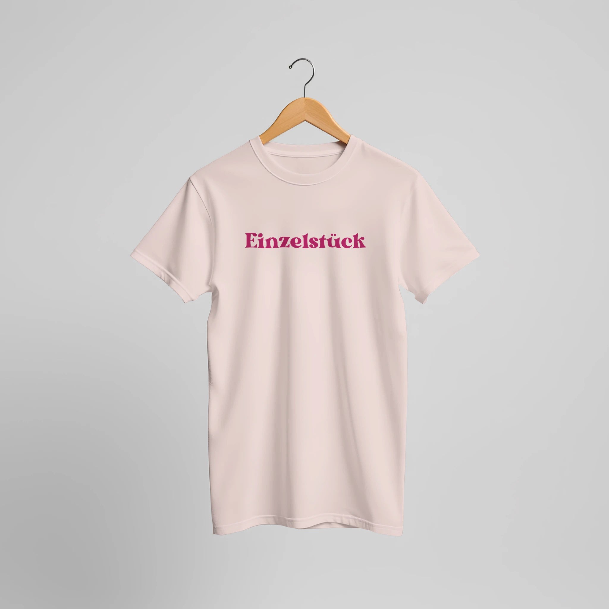 Sanftes rosa Unisex-T-Shirt aus hochwertiger Baumwolle mit pinkem Einzelstück-Print, nachhaltig und spirituell,.