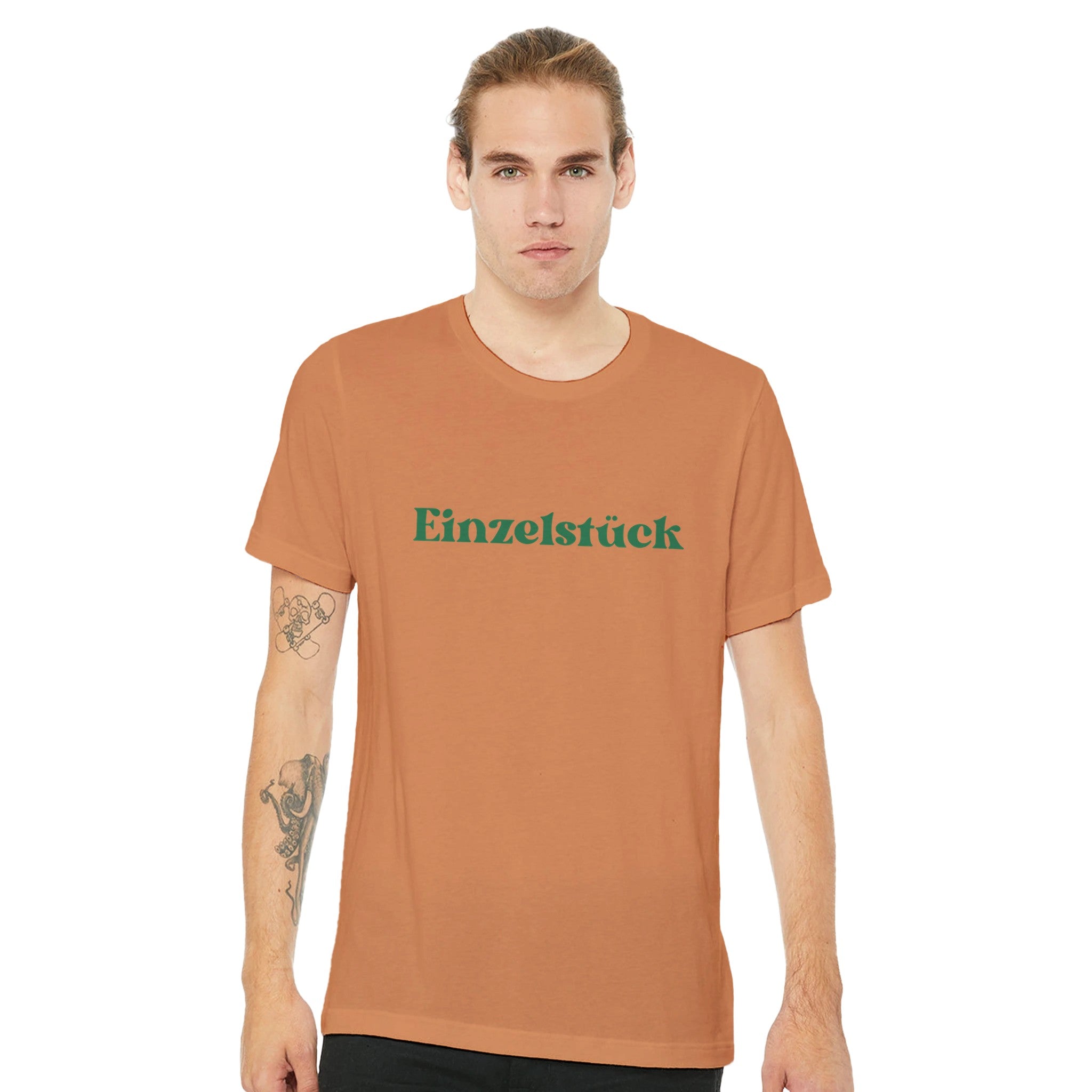 Unisex T-Shirt in gebranntem Orange aus nachhaltiger, hochwertiger Baumwolle mit grünem 
